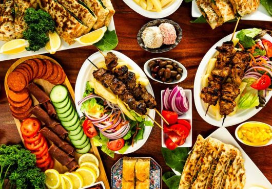 A table filled with food from Nenems Gozleme.