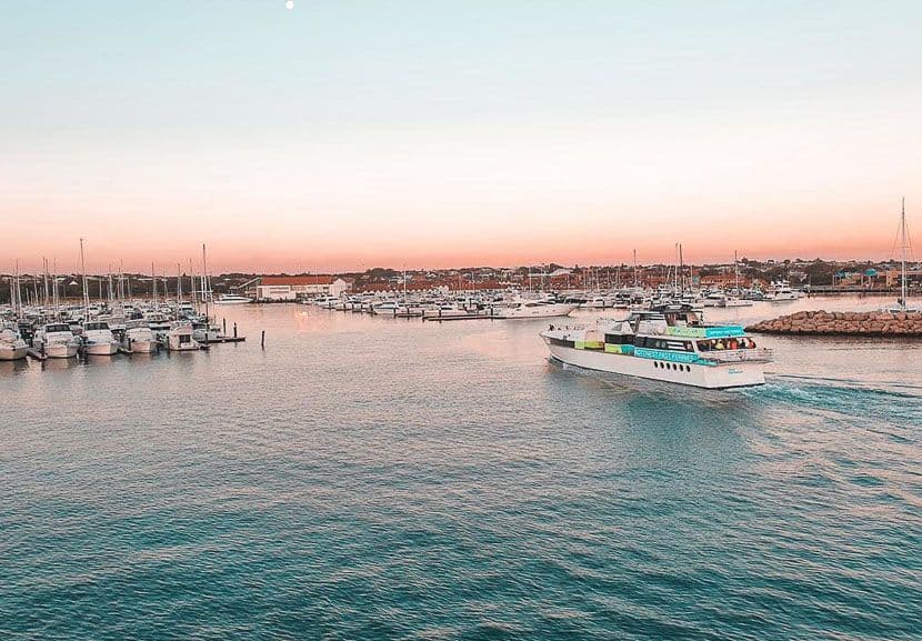 The Rottnest Ferry arriving into the harbour at sunset.